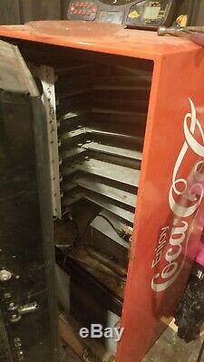 55 yr old coca cola glass bottle machine everything is original and works great