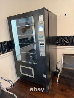 AMS Sensit 3, 39 combo Refrigerated Snack/soda vending machine. OUTDOOR/INDOOR