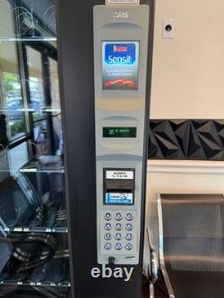 AMS Sensit 3, 39 combo Refrigerated Snack/soda vending machine. OUTDOOR/INDOOR