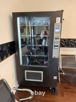 AMS Sensit 3, 39 combo Refrigerated Snack/soda vending machine. OUTDOOR/INDOOR