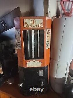 Antique candy vending machine