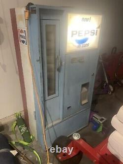 Antique soda vending machine