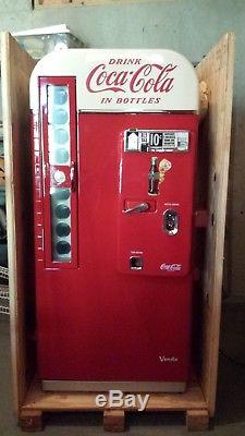 Beautiful restored 1957 Vendo H81 D Coca Cola machine. Most collectible