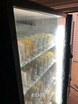 Ice-Cold Dixie-Narco 40-selection Glass Front Soda & Drinks Vending Machine