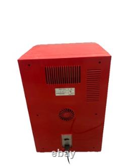 Koolatron model EC-23 red soda cooler/vending machine Turns On