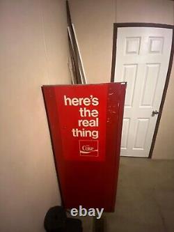 Large Red 1962 antique coke machine. Still works, comes with key