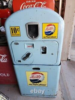 Pepsi Machine with bottle rack