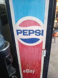 Pepsi Vending Machine. Giant Pepsi logo. Everything works. We have have the key