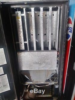 Pepsi Vending Machine. Giant Pepsi logo. Everything works. We have have the key