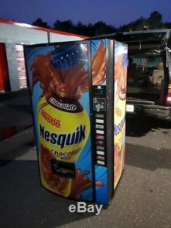 Soda Vending Machine. 10 Slot Selection. Nesquik logo. NICE