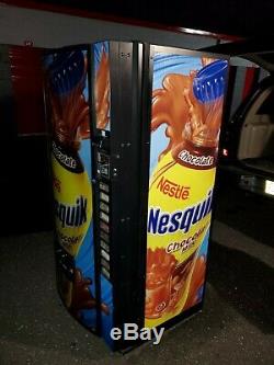 Soda Vending Machine. 10 Slot Selection. Nesquik logo. NICE