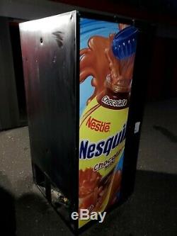 Soda Vending Machine. 10 Slot Selection. Nesquik logo. NICE