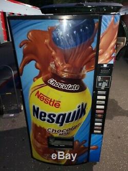 Soda Vending Machine. 10 Slot Selection. Nesquik logo. NICE