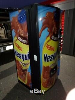 Soda Vending Machine. 10 Slot Selection. Nesquik logo. NICE