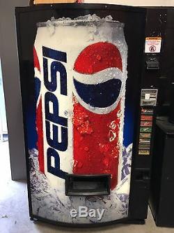 Soda Vending Machine. Used, Lights work and runs cold