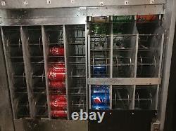 Soda pop vending machine USI model 3037-10B. Repair NOT WORKING Properly