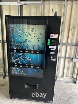 Vendo 721 Preowned Soda vending machine With Display, with card reader
