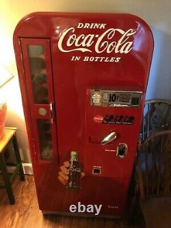 Vendo 81'51 Coke Machine. Works perfectly. Excellent condition