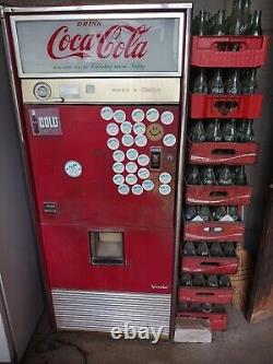 Vendo 92 original used vintage Coca-Cola soda vending machine never opened