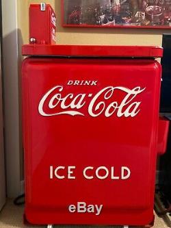 Vendo Junior 10 cent coke machine. Runs well. New inside rack