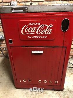 Vintage 1950 coke vending machine in original and working condition