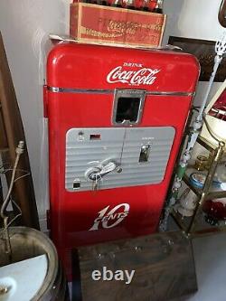 Vintage 1950's vendorlator 27A Coca Cola Machine
