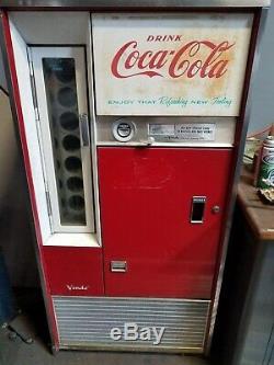 Vintage Coca-Cola Coke bottle machine runs quiet and gets very cold