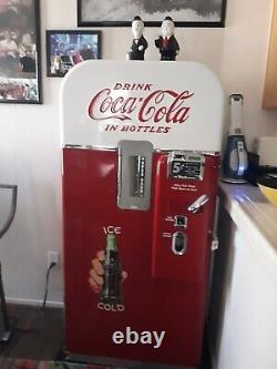 Vintage coke machine 5 cent. Early 1940's fully restored and operationalPristine