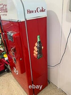 Vintage coke machine restored working condition