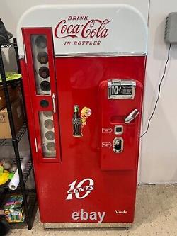 Vintage coke machine restored working condition